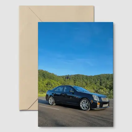 Cadillac CTS Black Sedan Mountain Road