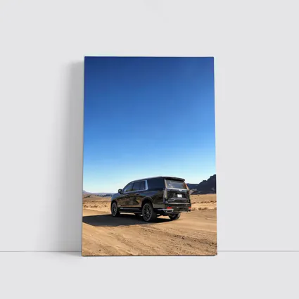 Black Cadillac Escalade Desert Dirt Road