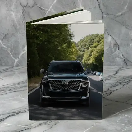 Black Cadillac Escalade On Forest Road
