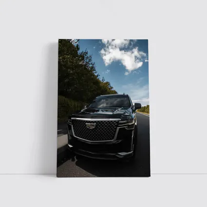 Black Cadillac Escalade on Open Road