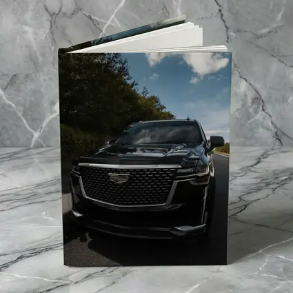 Black Cadillac Escalade on Open Road