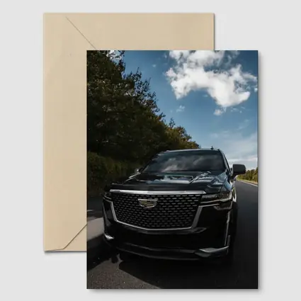 Black Cadillac Escalade on Open Road