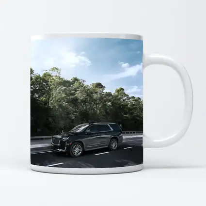 Black Cadillac Escalade SUV On Highway