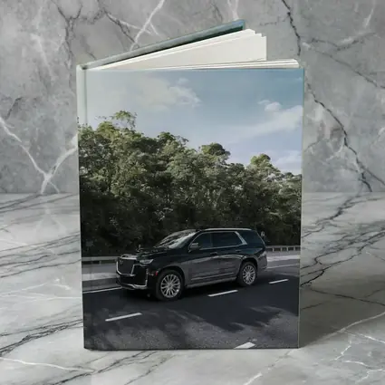 Black Cadillac Escalade SUV On Highway