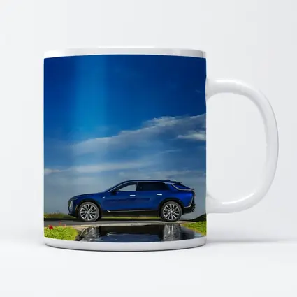 Cadillac Lyriq Blue SUV Cloudy Sky
