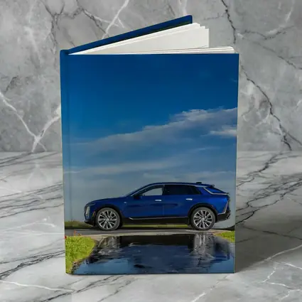 Cadillac Lyriq Blue SUV Cloudy Sky