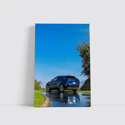 Cadillac IQ Blue SUV Wet Road