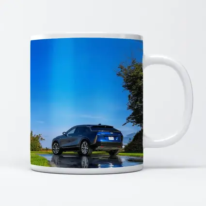 Cadillac IQ Blue SUV Wet Road
