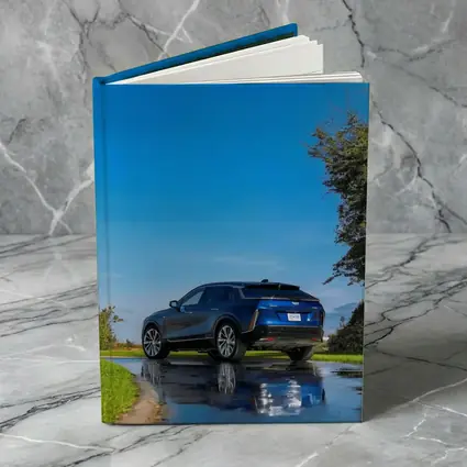 Cadillac IQ Blue SUV Wet Road