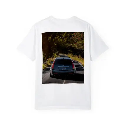 Cadillac CTS Wagon Driving Through Forest Road