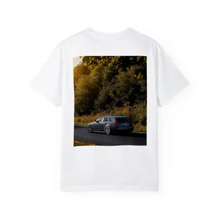 Cadillac CTS Wagon Rolling Through Forest Road