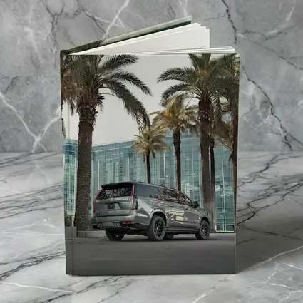Cadillac Escalade Gray Under Palm Trees