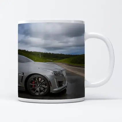 Cadillac CTS Silver Sedan Wet Road
