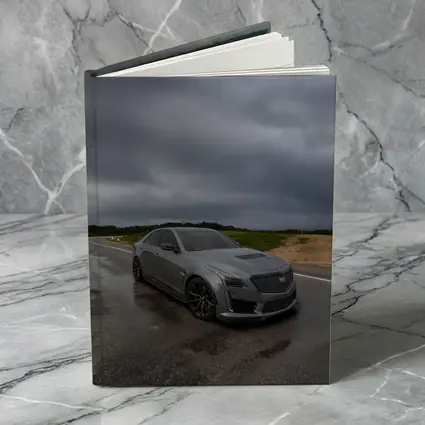 Cadillac CTS Gray Sedan Stormy Road