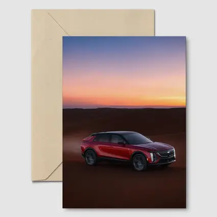 Cadillac Lyriq Red SUV Desert Sunset