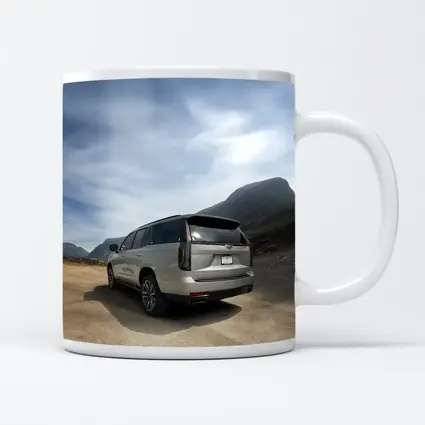 Cadillac Escalade Silver SUV Mountain Road