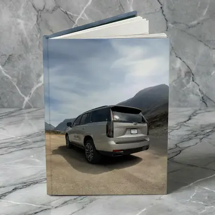 Cadillac Escalade Silver SUV Mountain Road