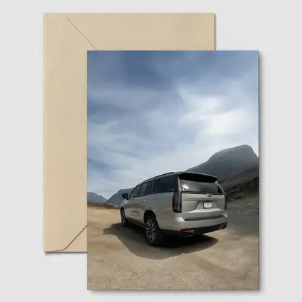 Cadillac Escalade Silver SUV Mountain Road