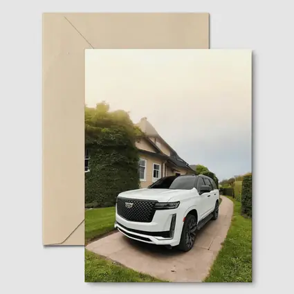 White Cadillac Escalade Parked Estate Driveway