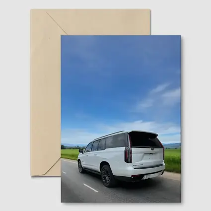 Cadillac Escalade White SUV Open Road