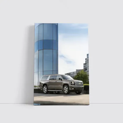 Chevrolet Suburban Parked Outside Glass Building