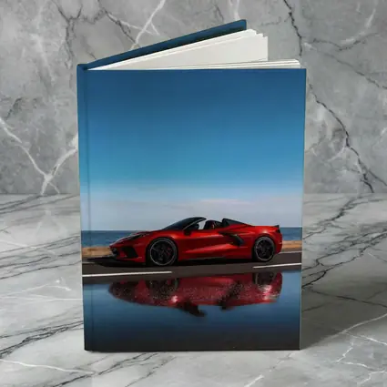 Red Chevrolet Corvette Coastal Road Side View