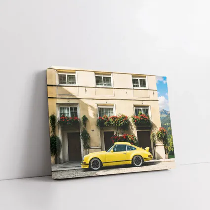 Yellow Porsche 911 Parked Alpine Village