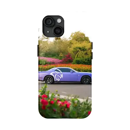 Purple Dodge Challenger Parked Near Flowers