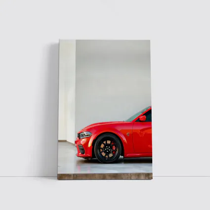Red Dodge Charger Parked in Garage