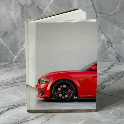 Red Dodge Charger Parked in Garage