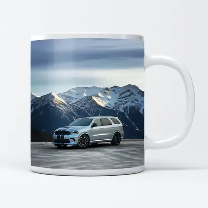 Dodge Durango Silver SUV Snowy Mountain Backdrop