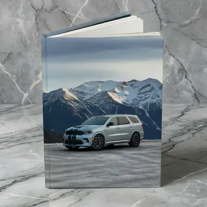 Dodge Durango Silver SUV Snowy Mountain Backdrop