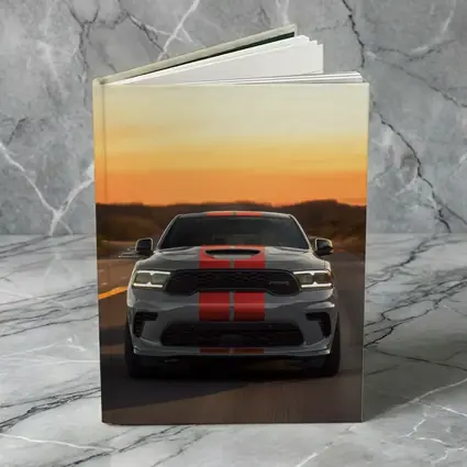 Dodge Durango Racing Down Road At Sunset