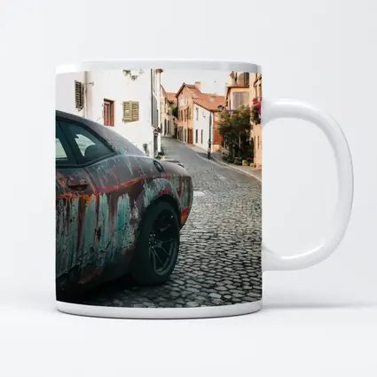 Rusty Dodge Challenger on Cobblestone Street