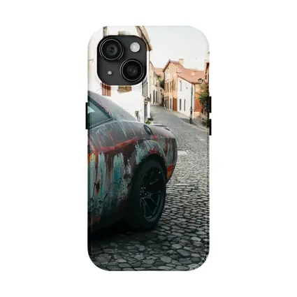 Rusty Dodge Challenger on Cobblestone Street