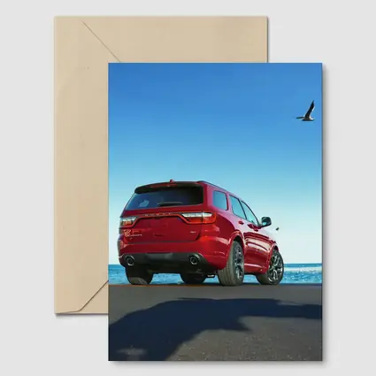 Dodge Durango Red SUV Ocean Background