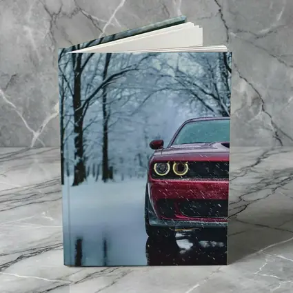 Red Dodge Challenger In Snowy Winter Forest