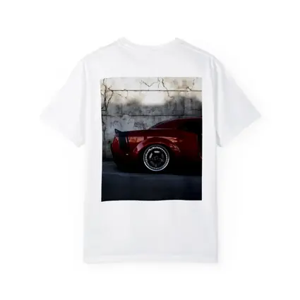Red Dodge Challenger Parked Against Concrete Wall