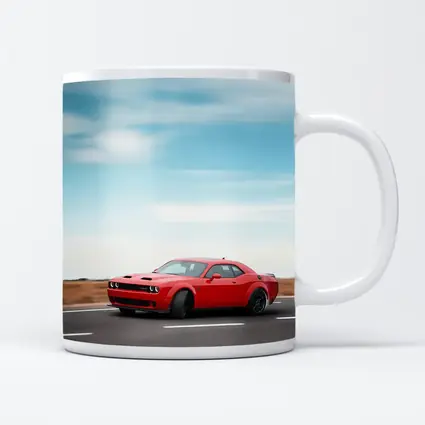 Red Dodge Challenger Speeding On Open Road