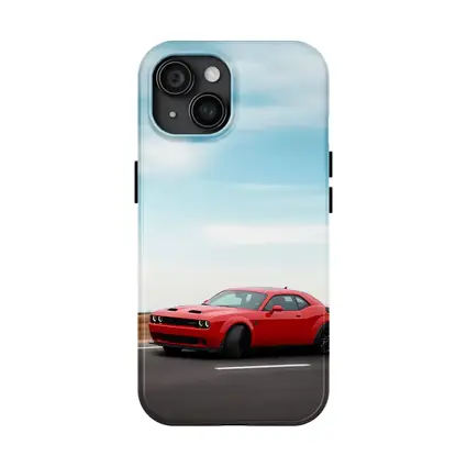 Red Dodge Challenger Speeding On Open Road