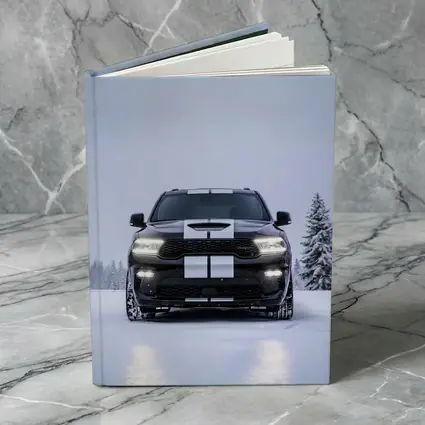 Dodge Durango Black SUV Snowy Winter Scene