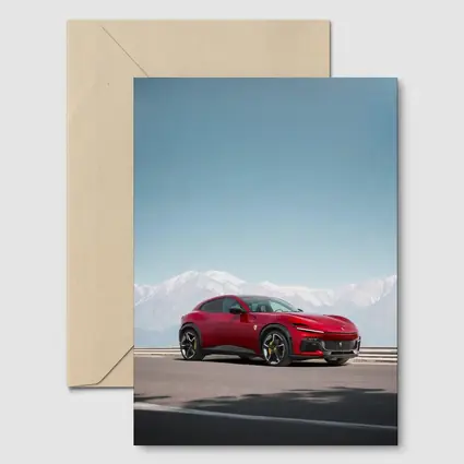 Ferrari Purosangue Red Snow Capped Mountains