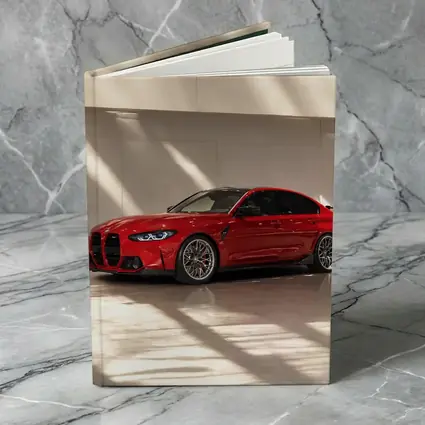 BMW M3 Red Sedan Indoor Garage Setting