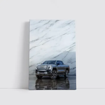 GMC Sierra EV Against Marble Wall