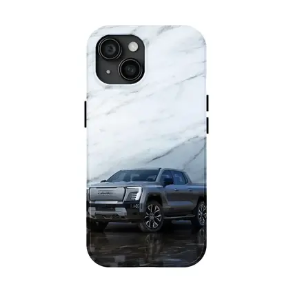 GMC Sierra EV Against Marble Wall