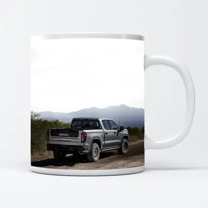 GMC Sierra Truck Dusty Dirt Road Mountains