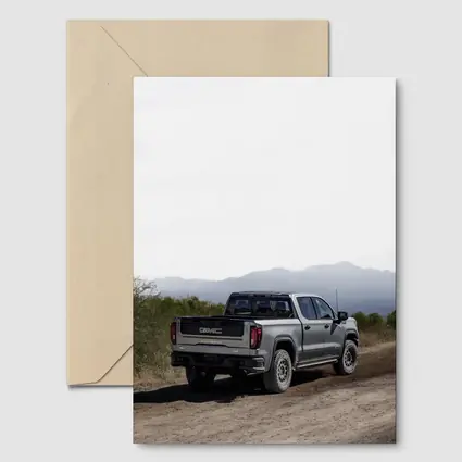 GMC Sierra Truck Dusty Dirt Road Mountains