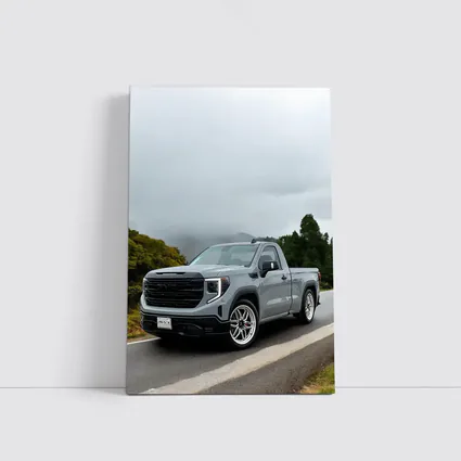 GMC Sierra Truck on Misty Mountain Road