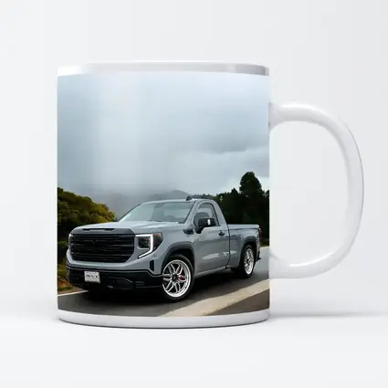 GMC Sierra Truck on Misty Mountain Road