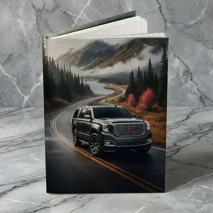 GMC Yukon SUV on Misty Mountain Road